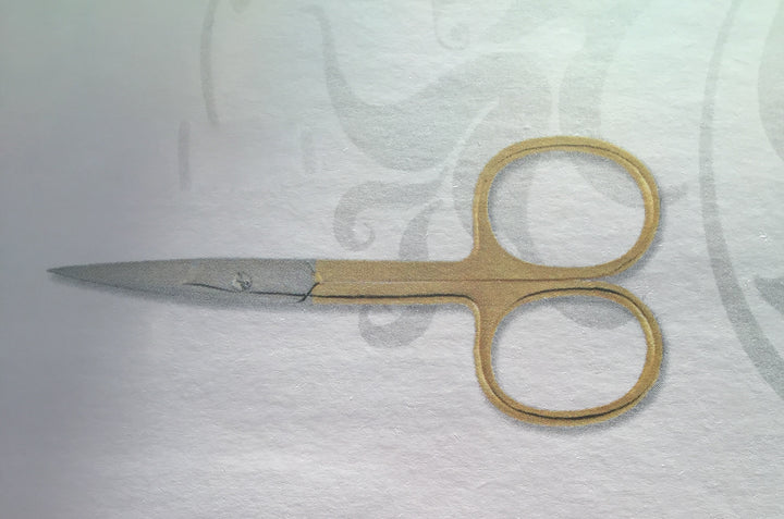 TRI cuticle scissors half gold.